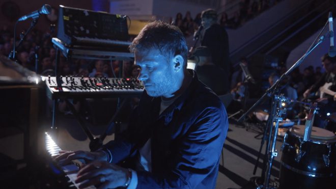 Damon Albarn plays the keyboard at The Last Poets performance.